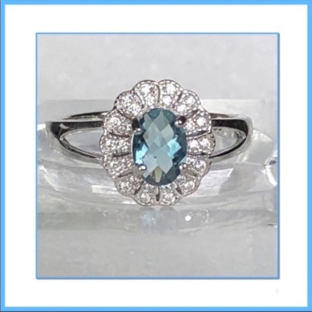 NWOT BLUE CZ AND STERLING RING